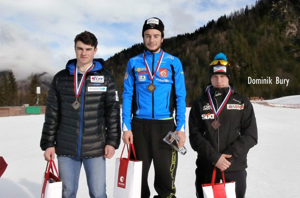 Dominik Bury na podium w Planicy